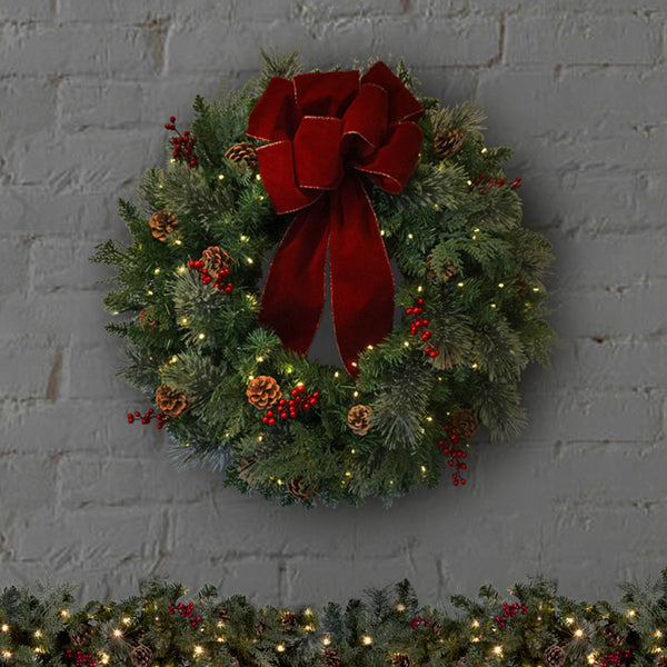 30" Pre-Lit Artificial Christmas Wreath with Pine Cones, Red Berries, and Velvet Bow